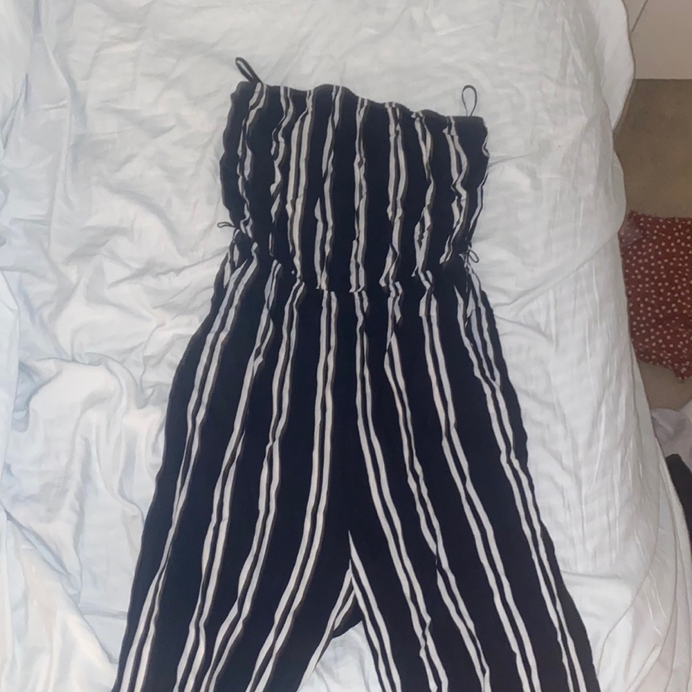 blue jumper with white stripes